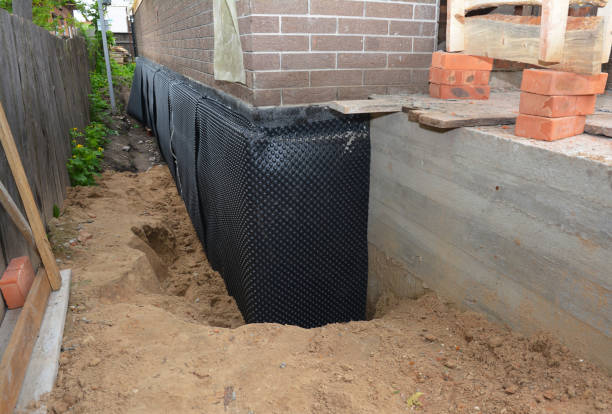 SJ Waterproofing Pros technician performing targeted Waterproofing assessment in Passaic, NJ